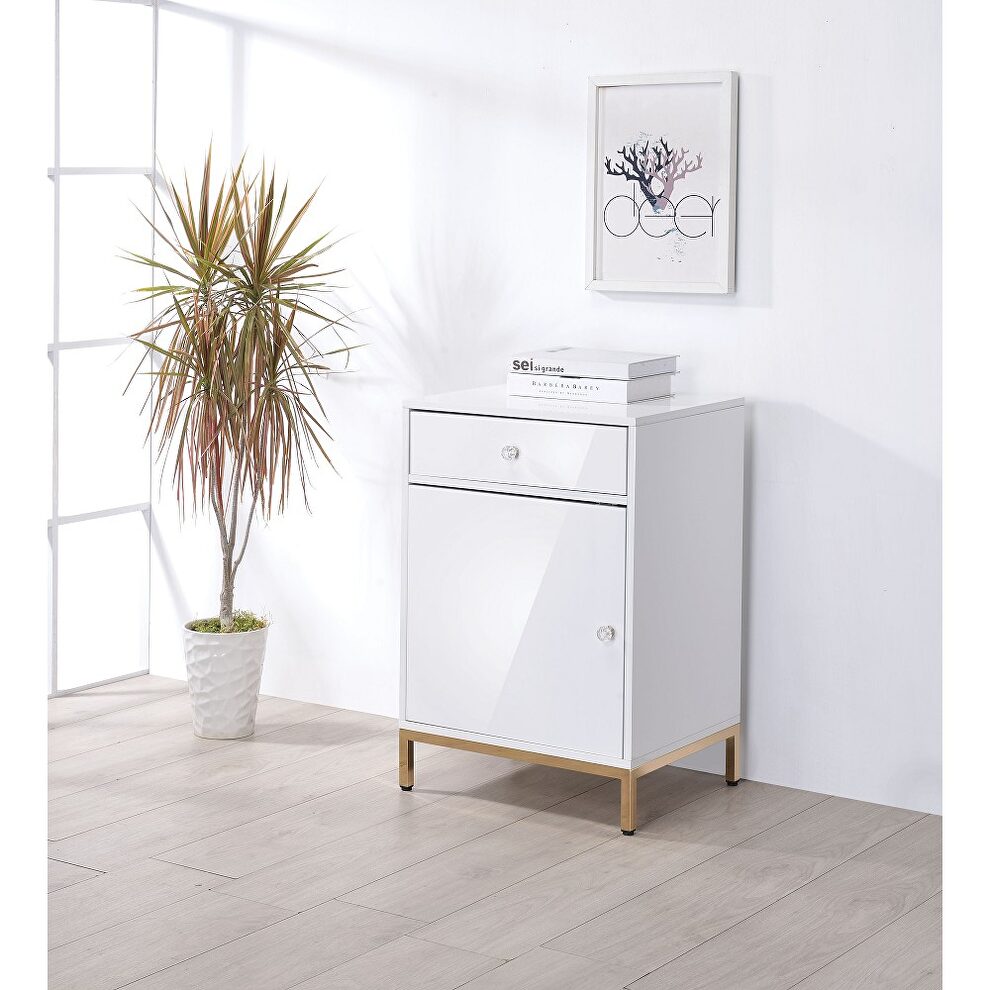 White high gloss finish with a gold metal base cabinet by La Spezia