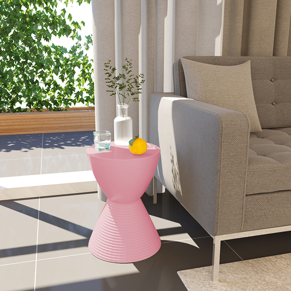 Pink smooth top over a ribbed design bottom side table by Leisure Mod