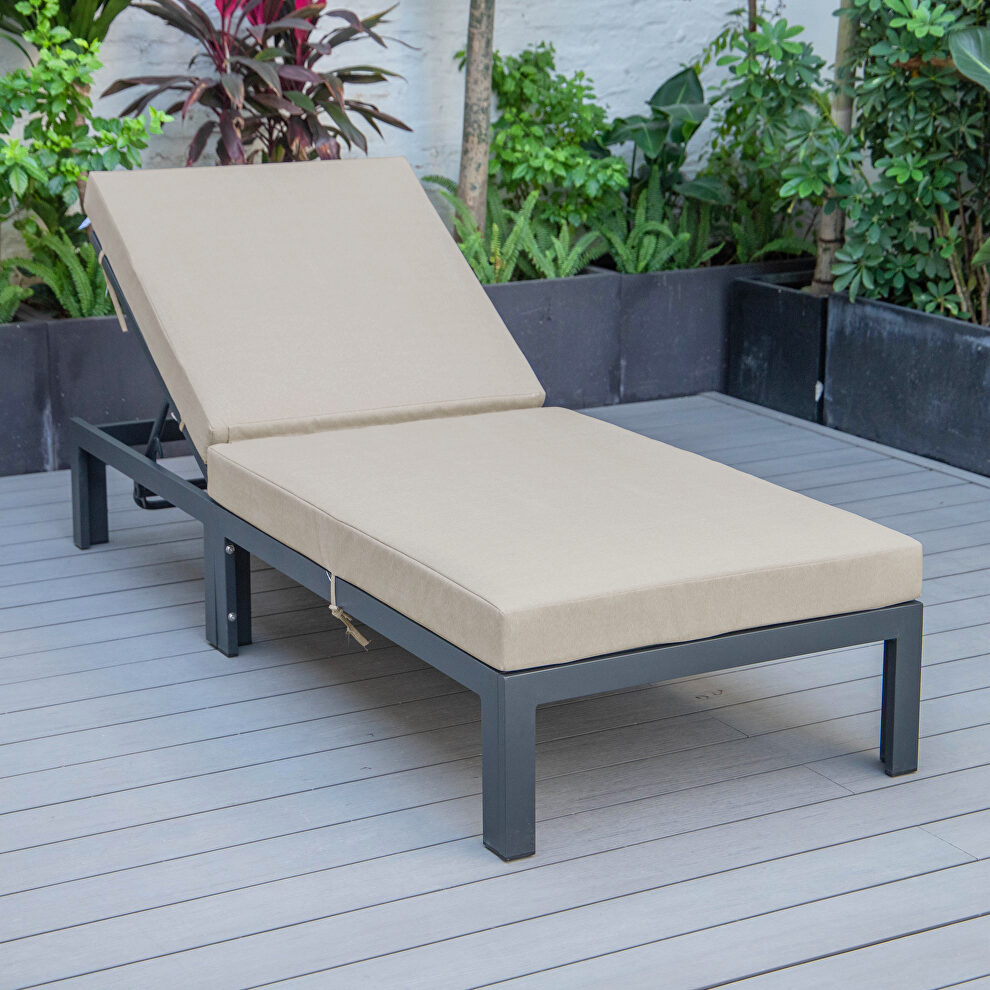 Modern outdoor chaise lounge chair with beige cushions by Leisure Mod