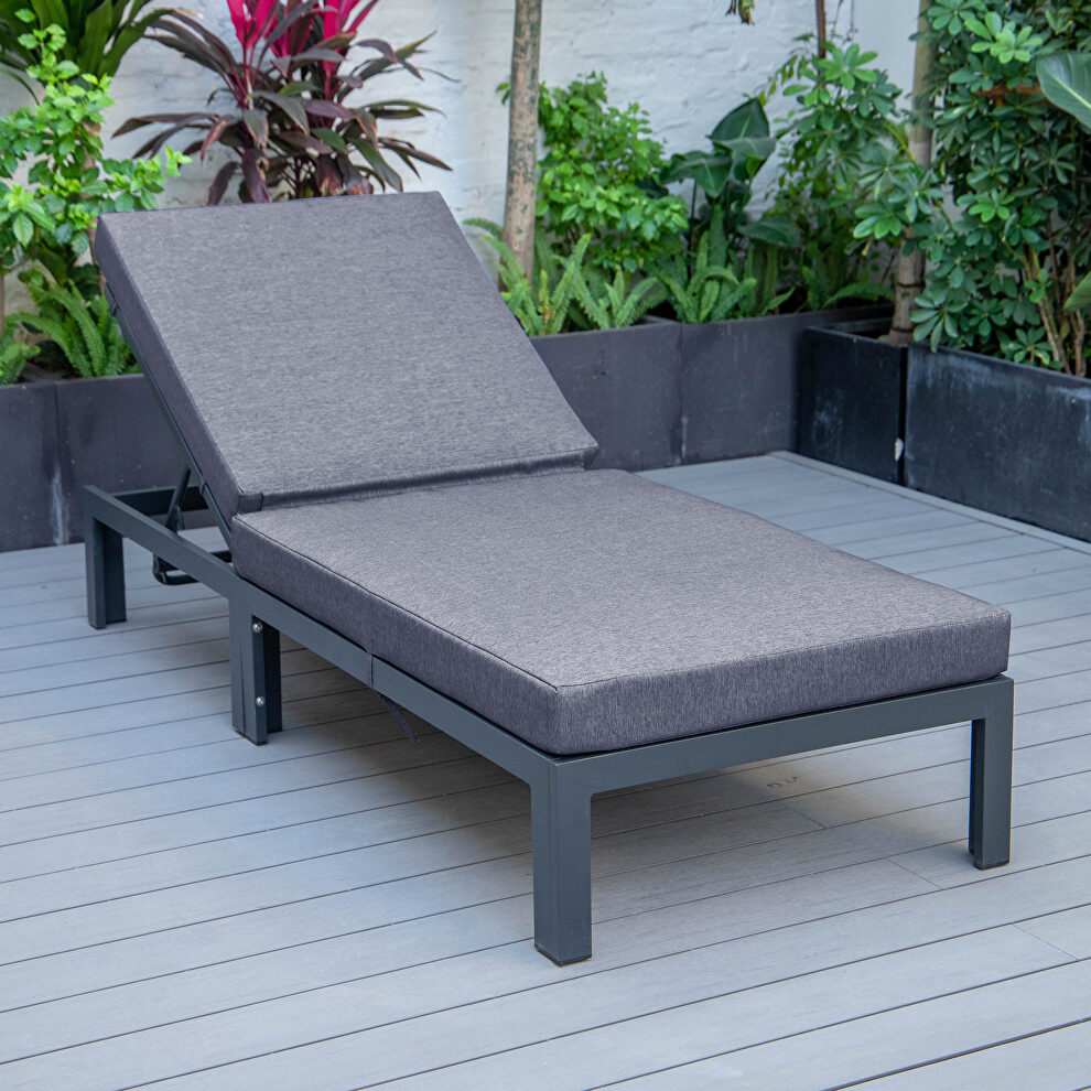 Modern outdoor chaise lounge chair with blue cushions by Leisure Mod
