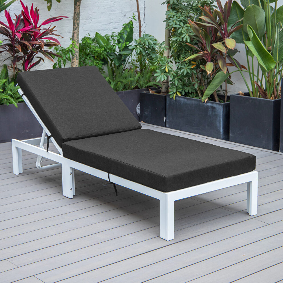 Modern outdoor white chaise lounge chair with black cushions by Leisure Mod