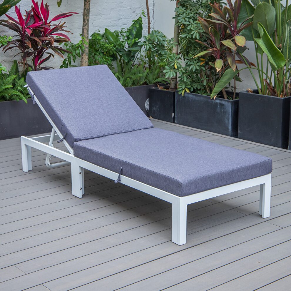 Modern outdoor white chaise lounge chair with blue cushions by Leisure Mod