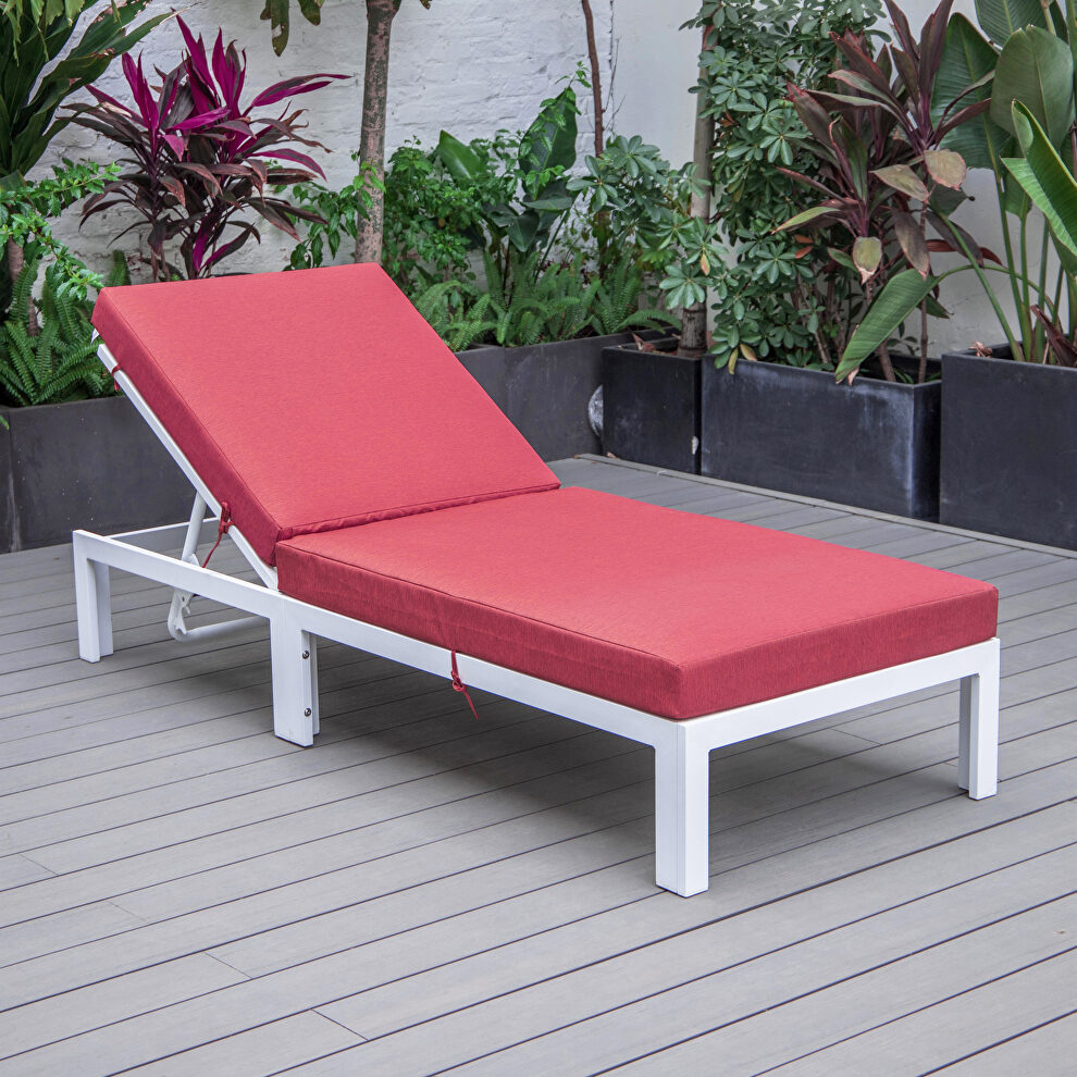 Modern outdoor white chaise lounge chair with red cushions by Leisure Mod