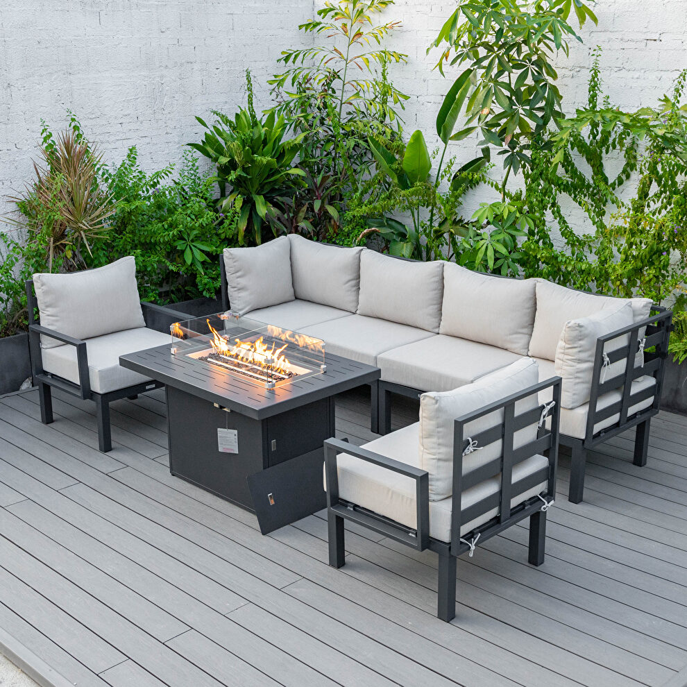 Beige cushions 7-piece patio sectional and fire pit table black aluminum by Leisure Mod
