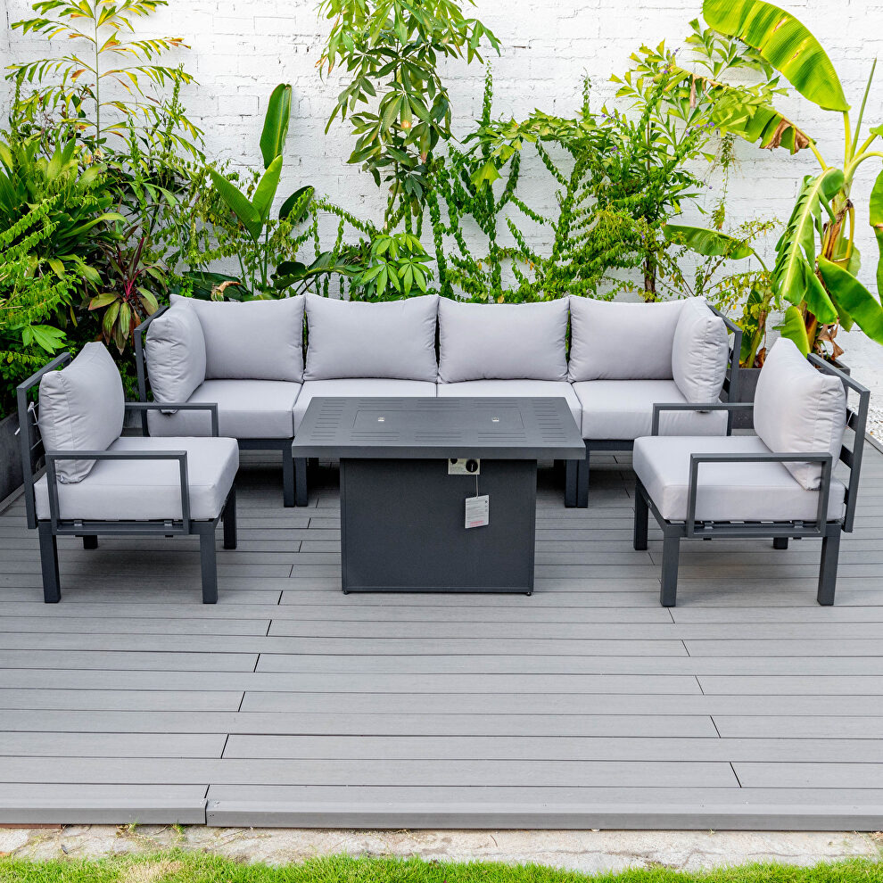 Light gray cushions 7-piece patio sectional and fire pit table black aluminum by Leisure Mod