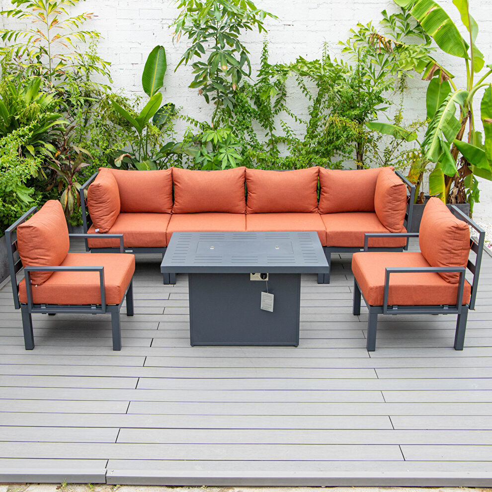Orange cushions 7-piece patio sectional and fire pit table black aluminum by Leisure Mod