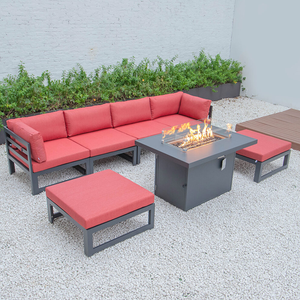 Red cushions 7-piece patio ottoman sectional and fire pit table black aluminum by Leisure Mod