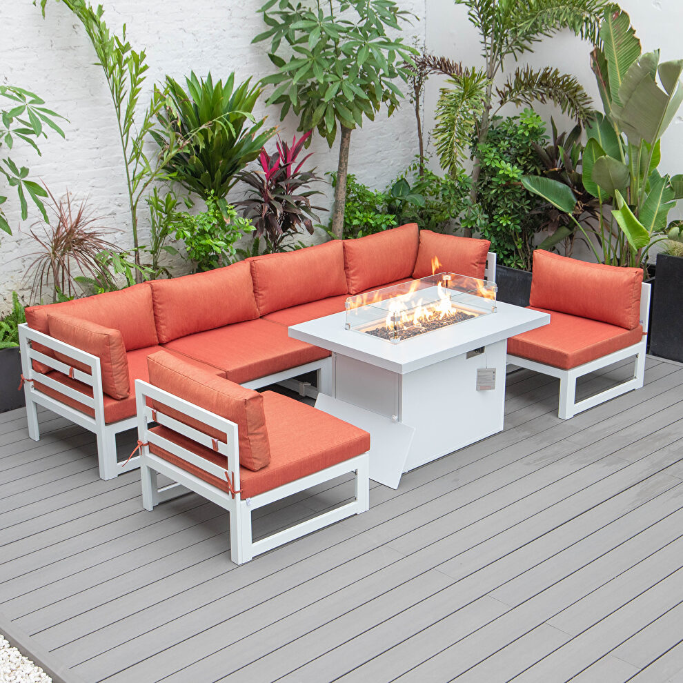 Orange cushions 7-piece patio sectional and fire pit table white aluminum by Leisure Mod