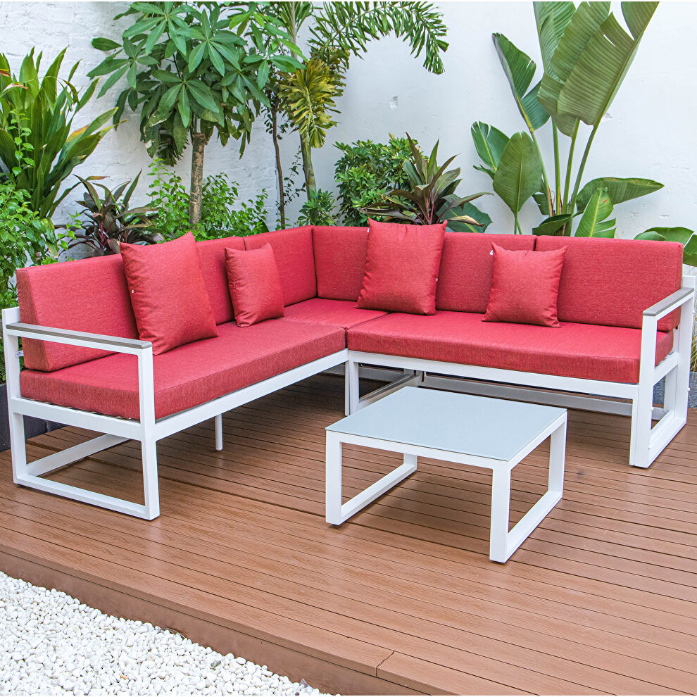 Red cushions and white base sectional with adjustable headrest & coffee table by Leisure Mod