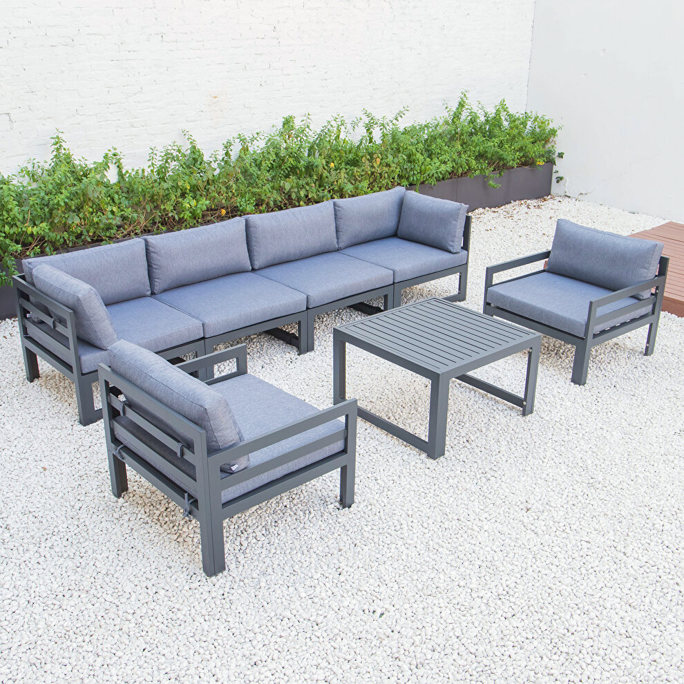 Blue cushions 7-piece patio sectional & coffee table set black aluminum by Leisure Mod