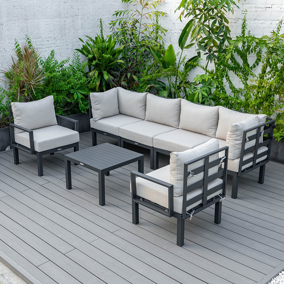 Beige finish cushions 7-piece patio sectional and coffee table set black aluminum by Leisure Mod