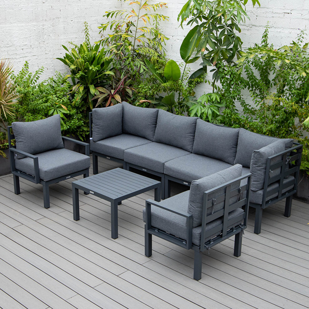 Black finish cushions 7-piece patio sectional and coffee table set black aluminum by Leisure Mod