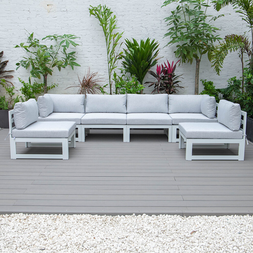 Light gray finish cushions 6-piece patio sectional in white aluminum by Leisure Mod