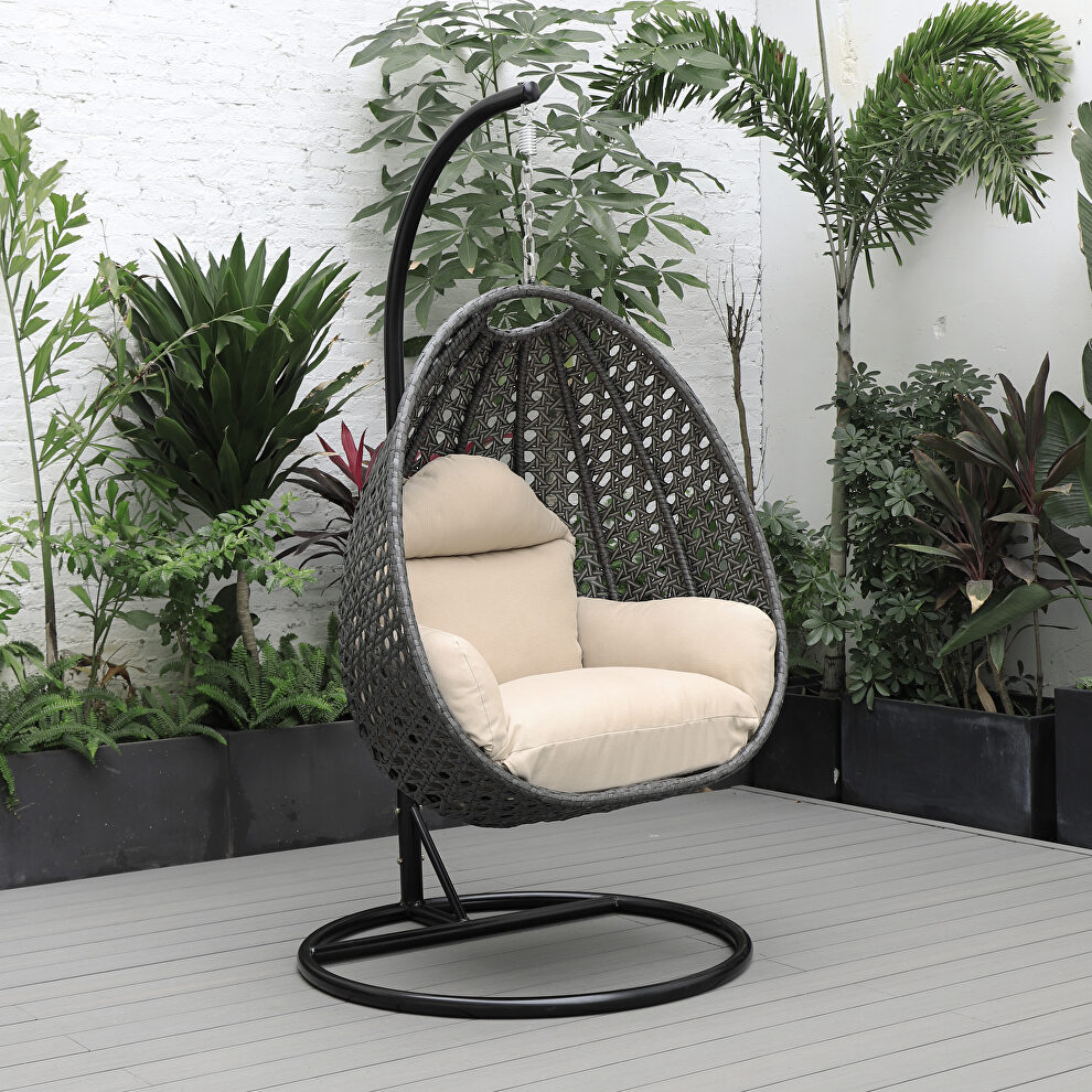 Beige cushion and charcoal wicker hanging egg swing chair by Leisure Mod