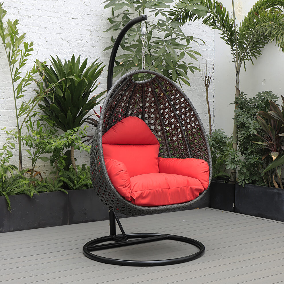 Red cushion and charcoal wicker hanging egg swing chairv by Leisure Mod