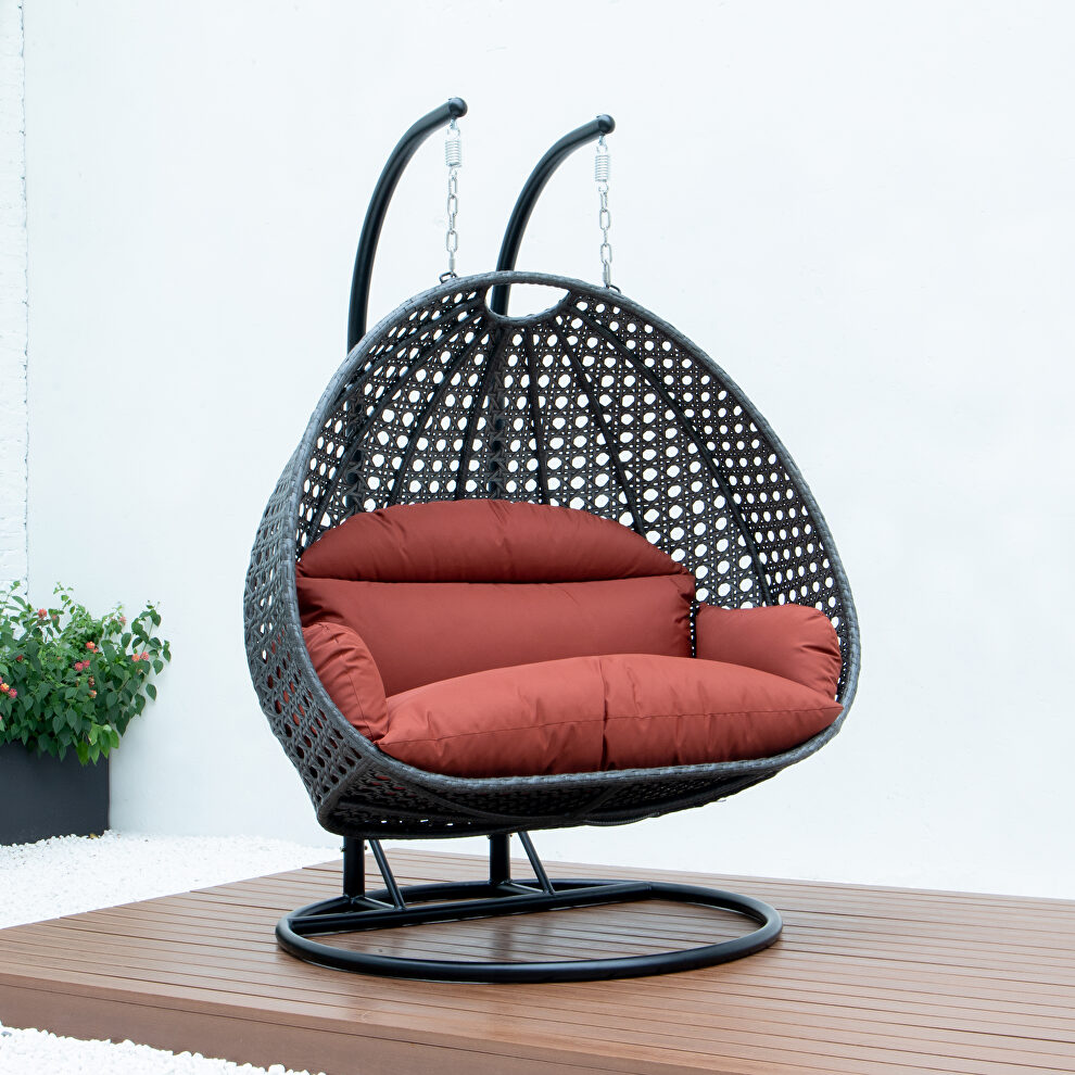 Dark orange wicker hanging double seater egg swing chair by Leisure Mod