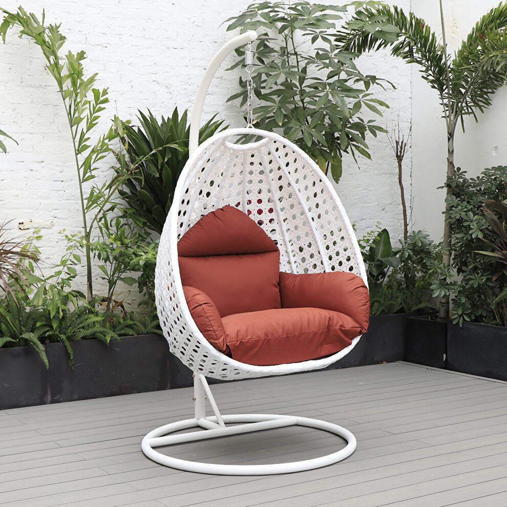 Cherry cushion and white wicker hanging egg swing chair by Leisure Mod