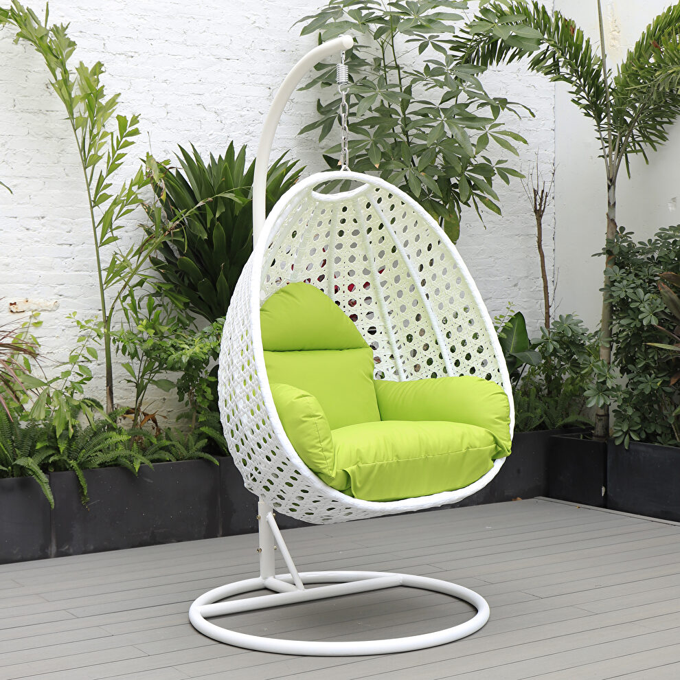 Light green cushion and white wicker hanging egg swing chair by Leisure Mod