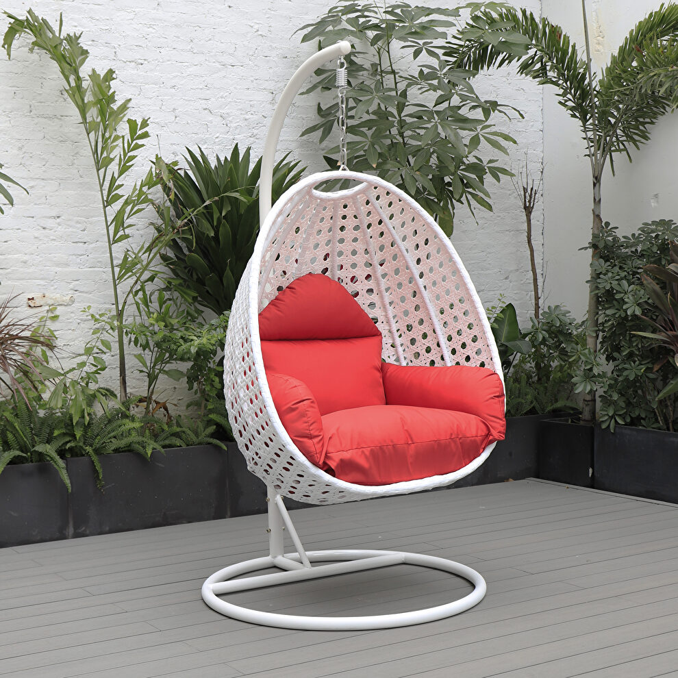 Red cushion and white wicker hanging egg swing chairv by Leisure Mod