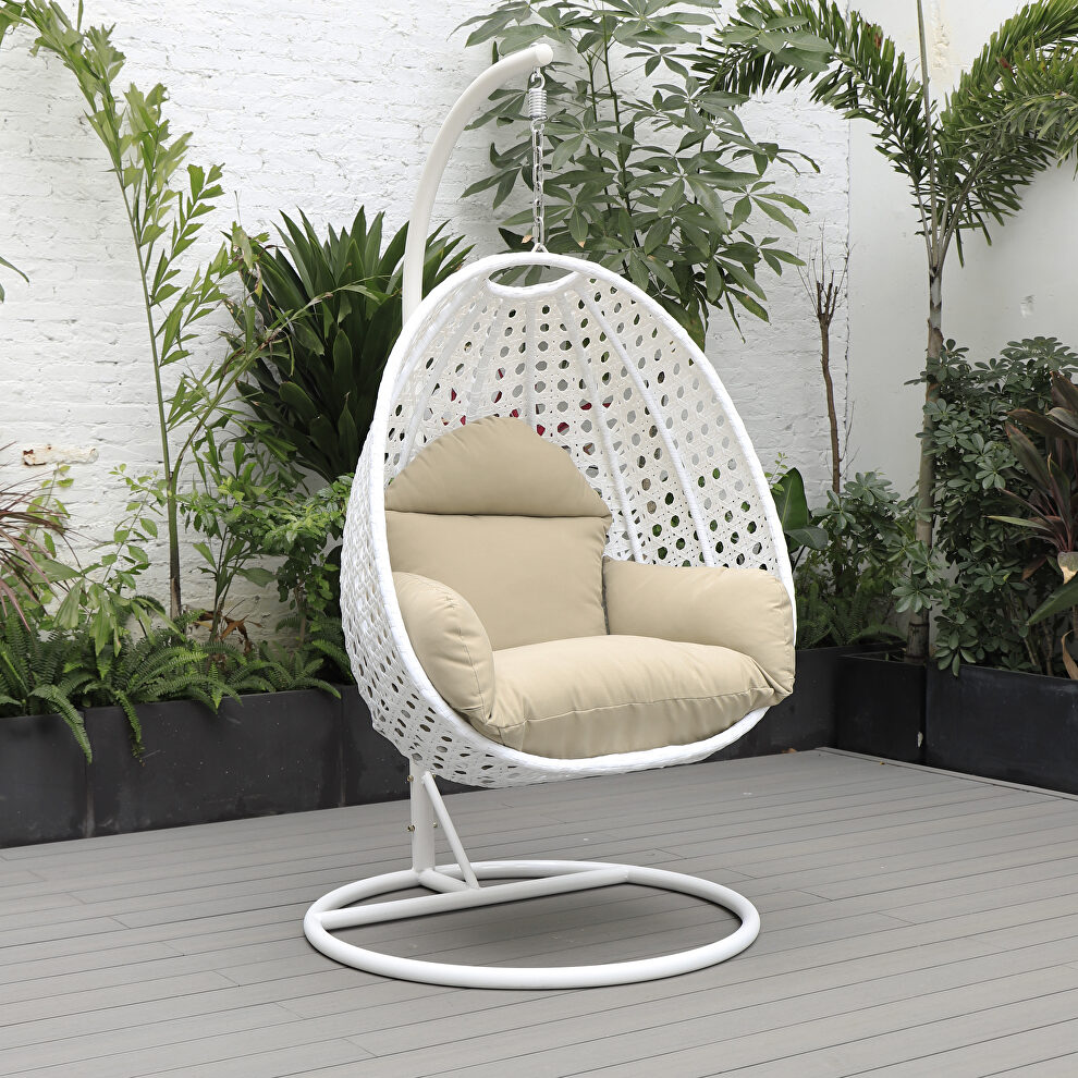 Taupe cushion and white wicker hanging egg swing chair by Leisure Mod