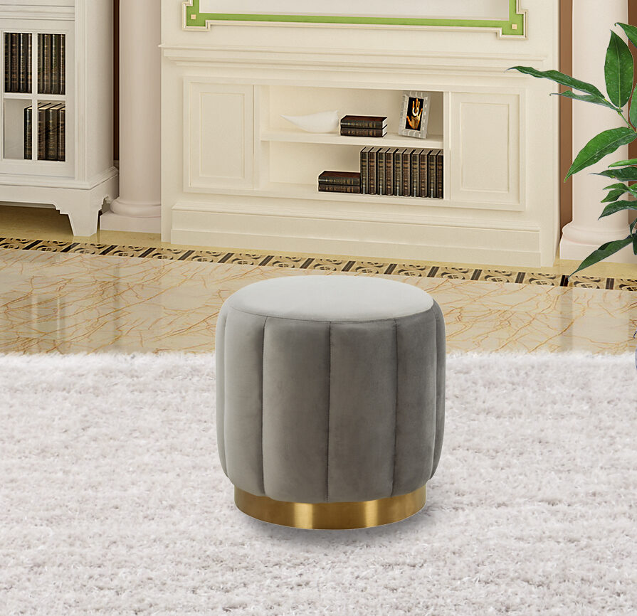 Light gray velvet upholstery modern round ottoman by Leisure Mod