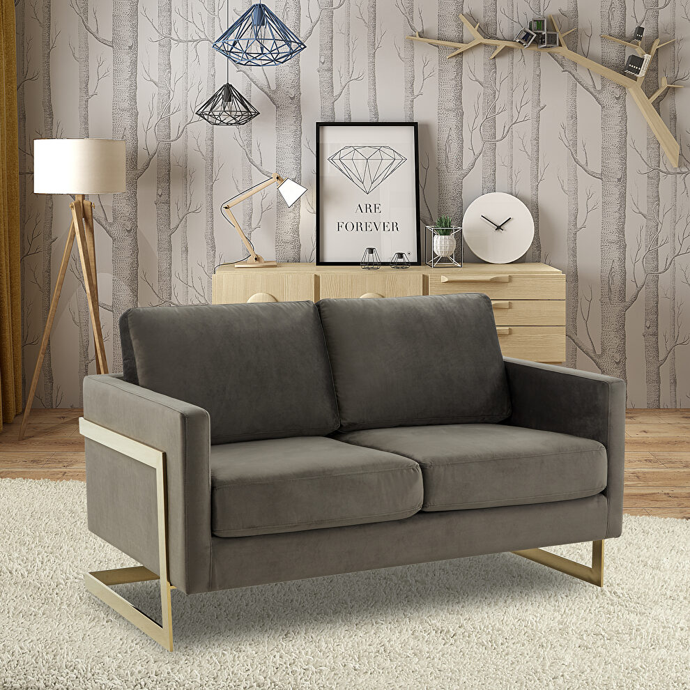 Modern mid-century upholstered dark gray velvet loveseat with gold frame by Leisure Mod