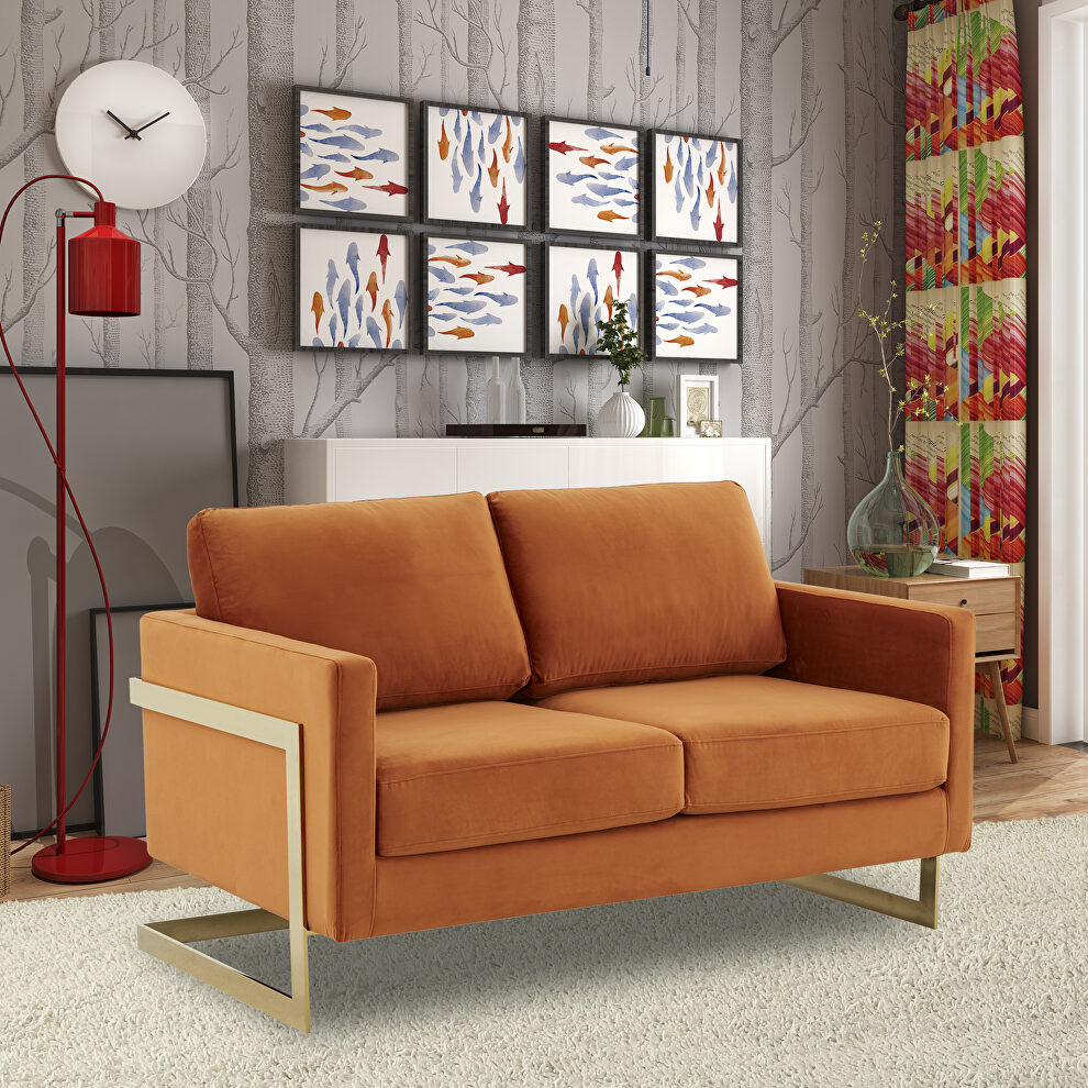 Modern mid-century upholstered orange marmalade velvet loveseat with gold frame by Leisure Mod
