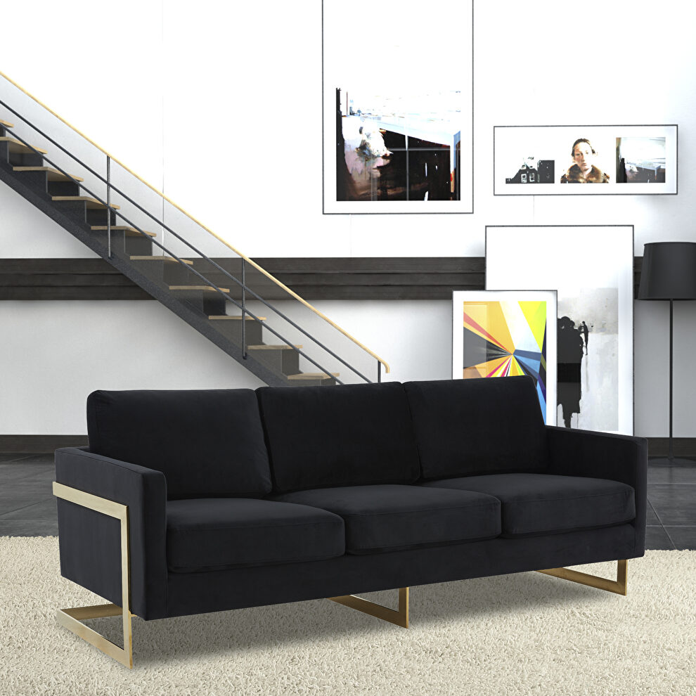 Modern mid-century upholstered midnight black velvet sofa with gold frame by Leisure Mod