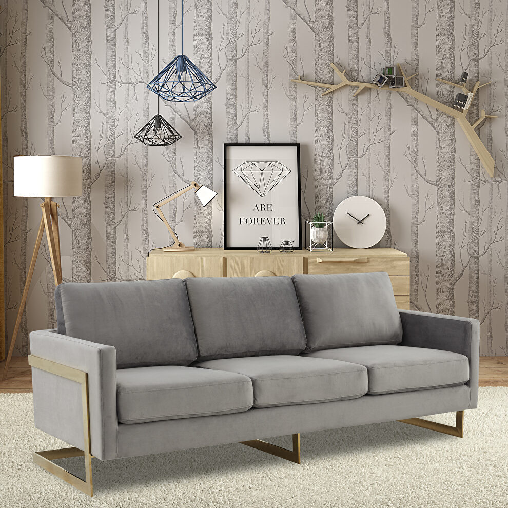 Modern mid-century upholstered light gray velvet sofa with gold frame by Leisure Mod