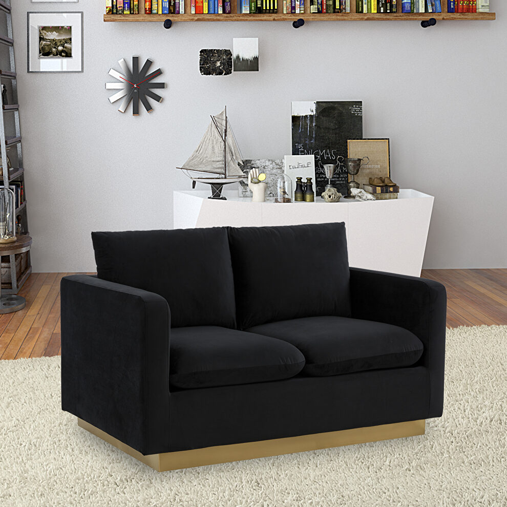 Modern style upholstered midnight black velvet loveseat with gold frame by Leisure Mod