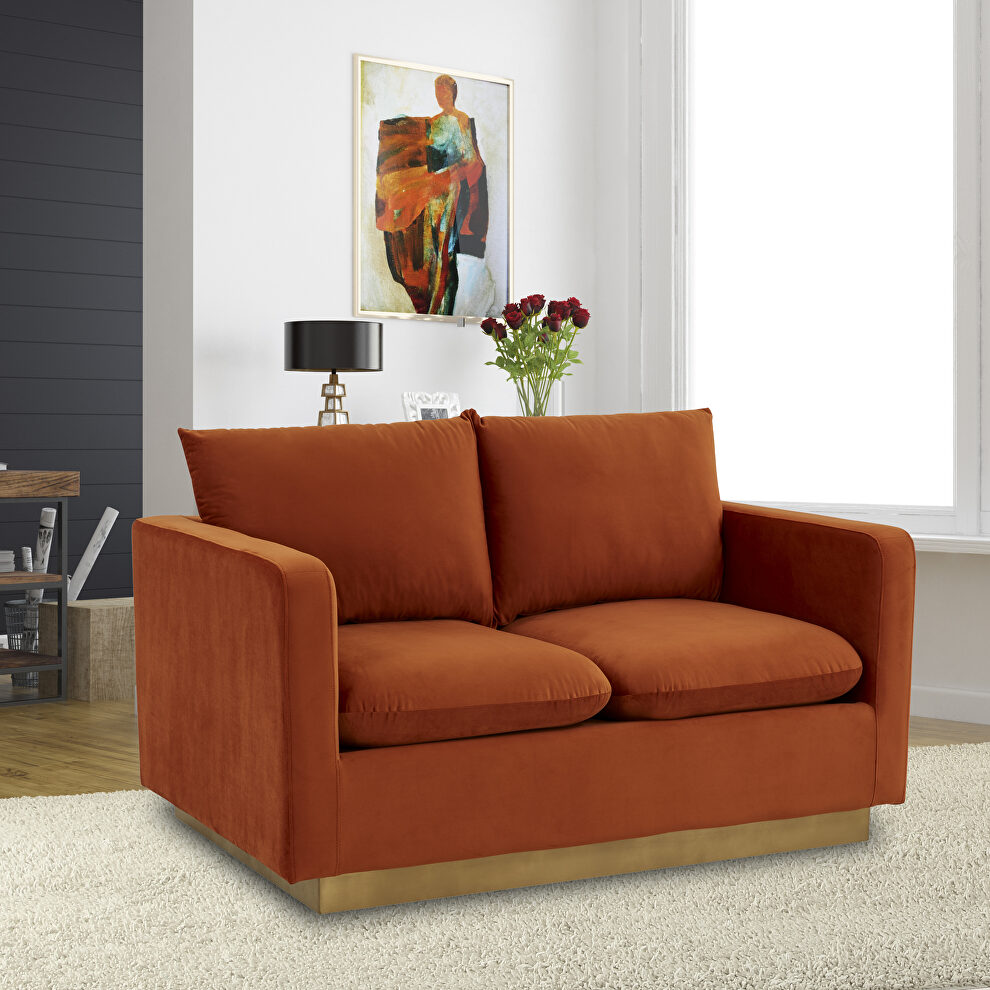 Modern style upholstered orange marmalade velvet loveseat with gold frame by Leisure Mod