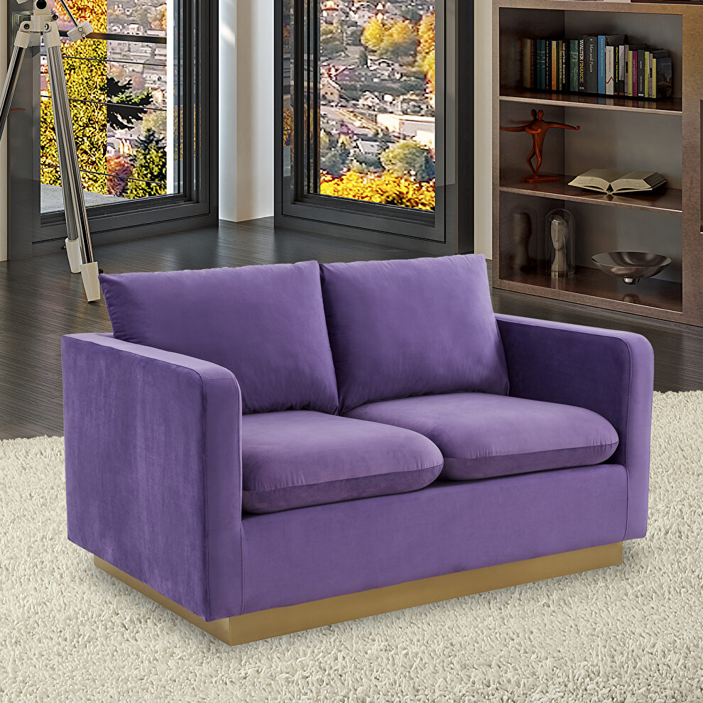 Modern style upholstered purple velvet loveseat with gold frame by Leisure Mod