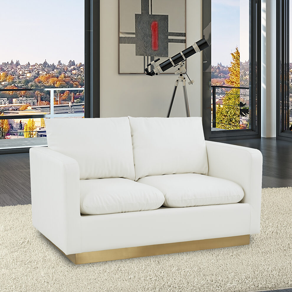 Modern style upholstered white leather loveseat with gold frame by Leisure Mod