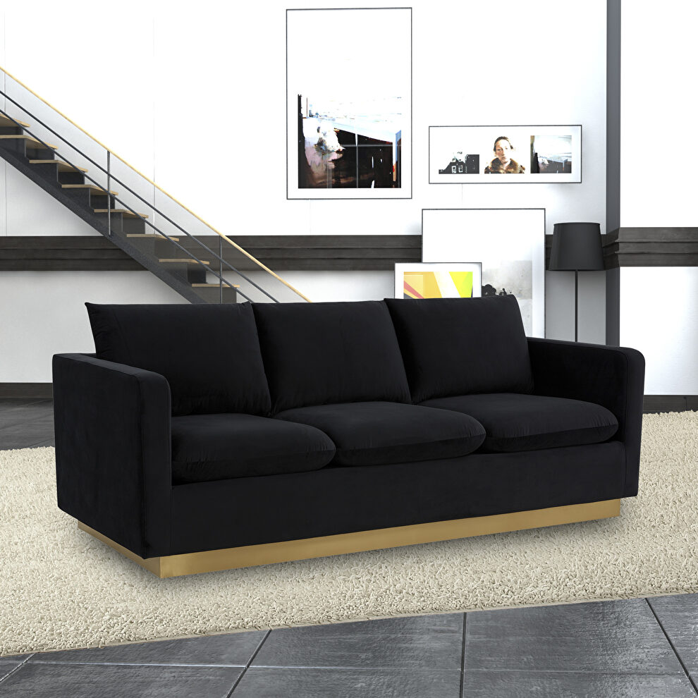 Modern style upholstered midnight black velvet sofa with gold frame by Leisure Mod