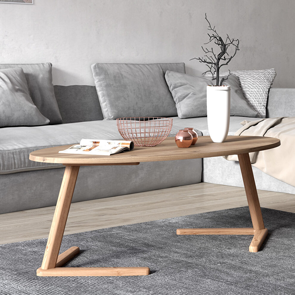 Elliptical coffee table in natural finish by Mod-Arte