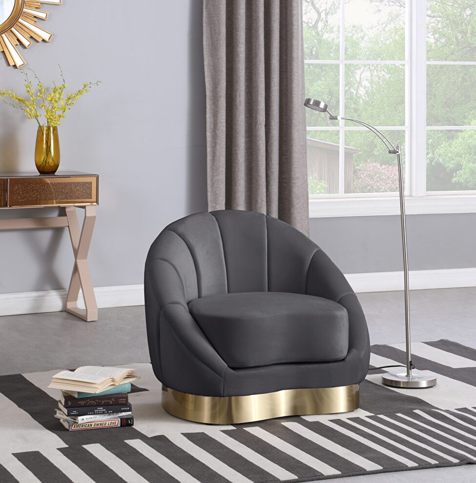Curved elegant velvet contemporary chair by Meridian