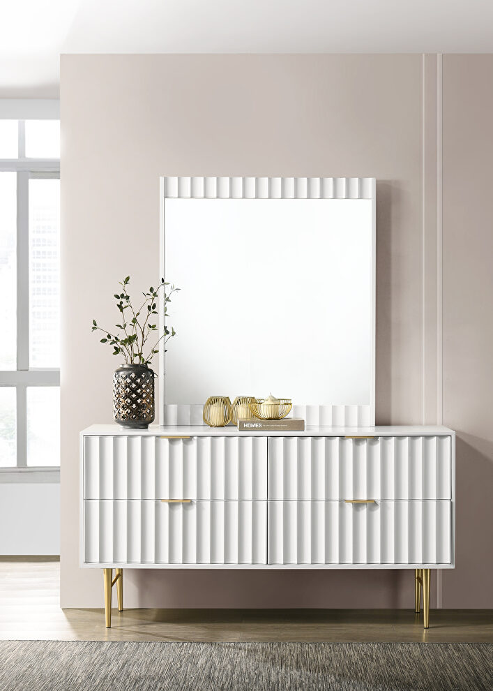 White stylish dresser w/ golden handles and legs by Meridian