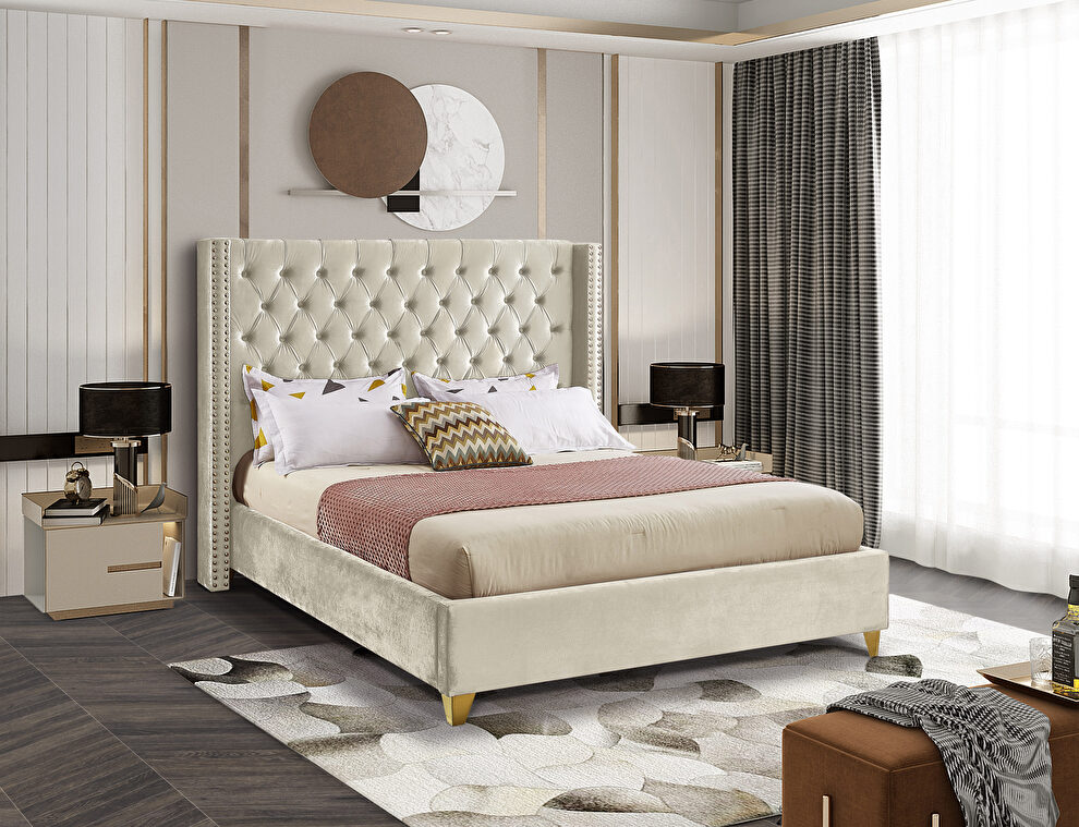 Modern gold legs / nailheads cream velvet bed by Meridian