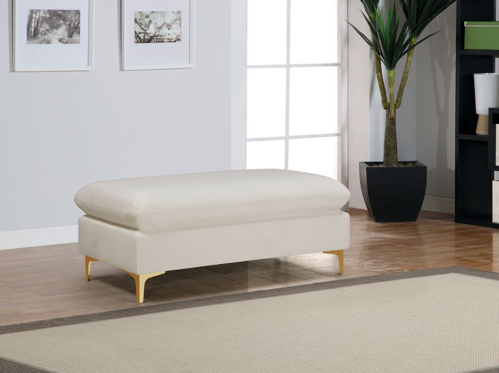 Contemporary velvet ottoman by Meridian