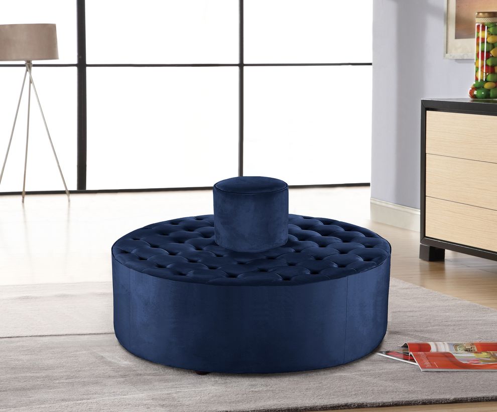 Navy velvet tufted round ottoman / seating bench by Meridian