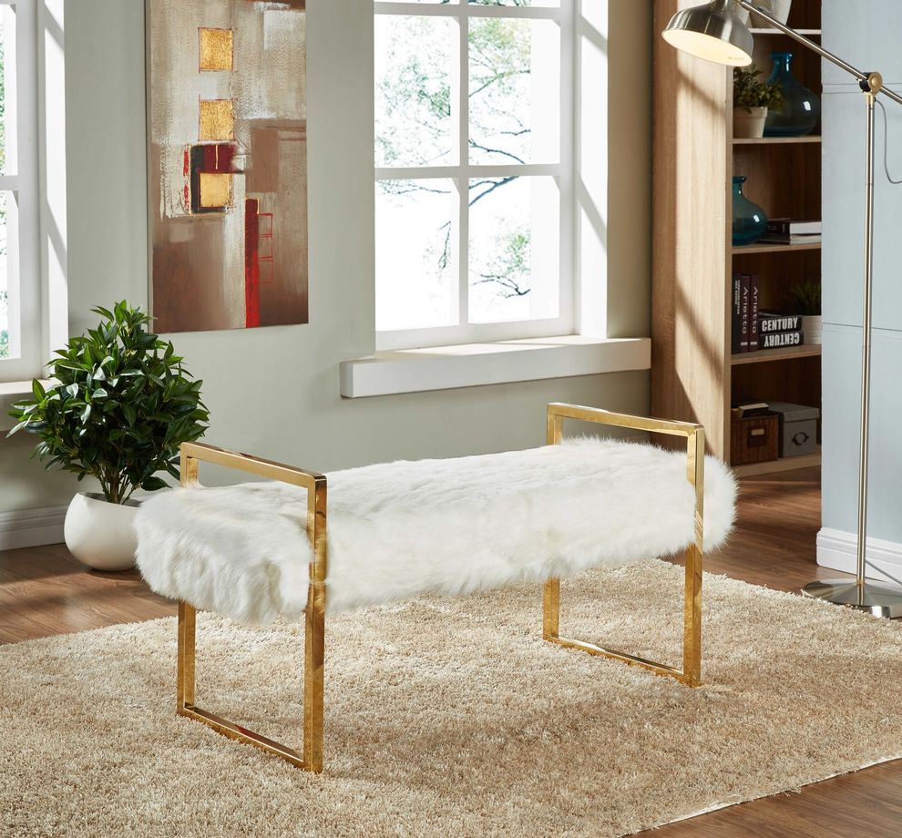 White fur bench with gold chrome base by Meridian