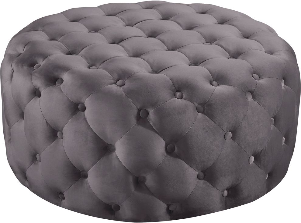 Gray velvet round tufted ottoman by Meridian