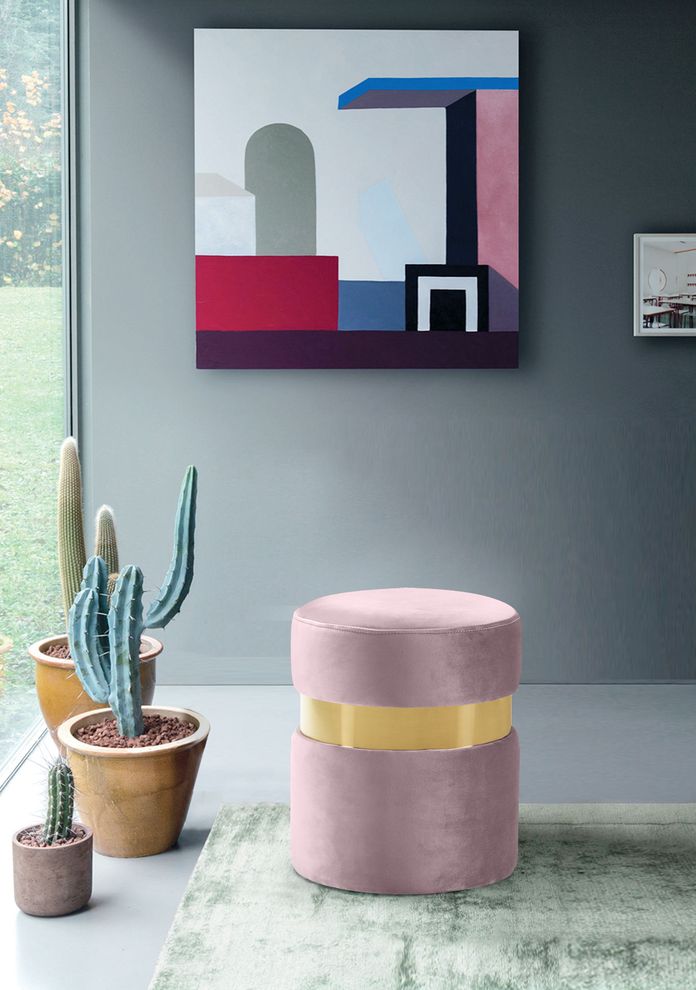 Round pink velvet ottoman by Meridian