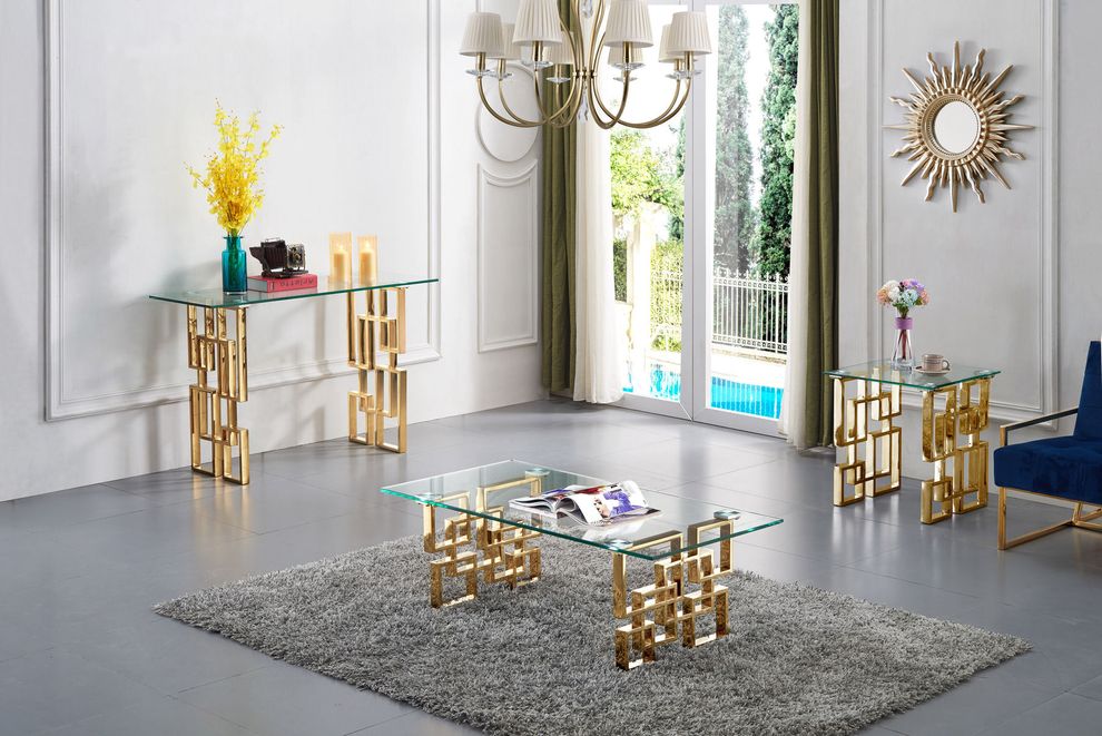Clear glass top / golden legs coffee table by Meridian