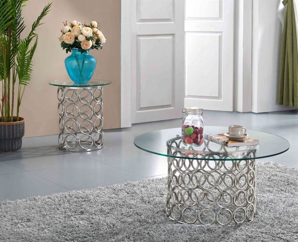 Round glass modern coffee table w/ metal base by Meridian