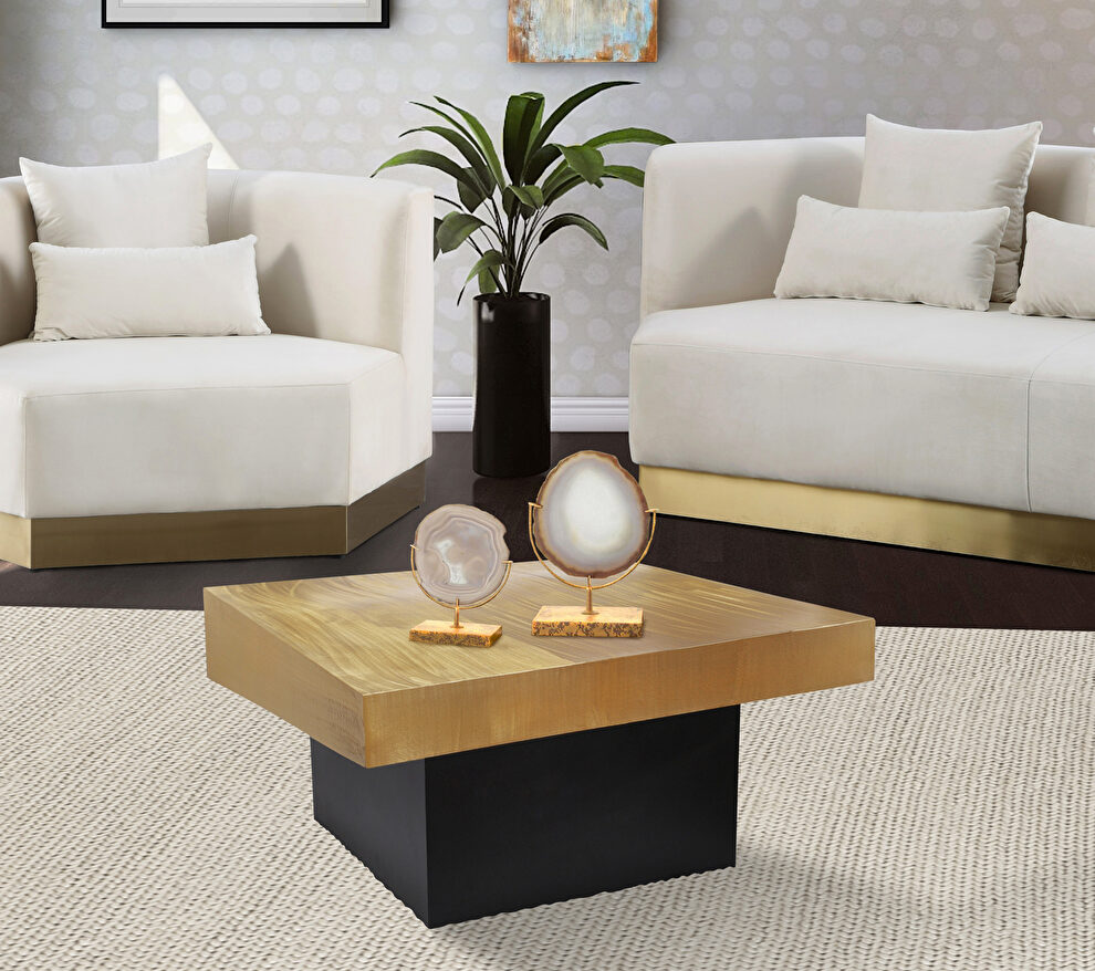 Rich gold / black metal coffee table in glam style by Meridian