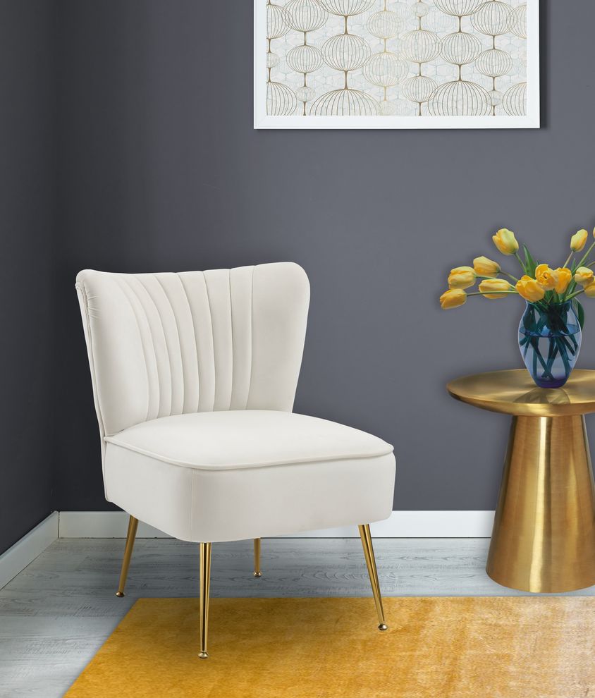 Elegant modern channel tufting chair in cream by Meridian