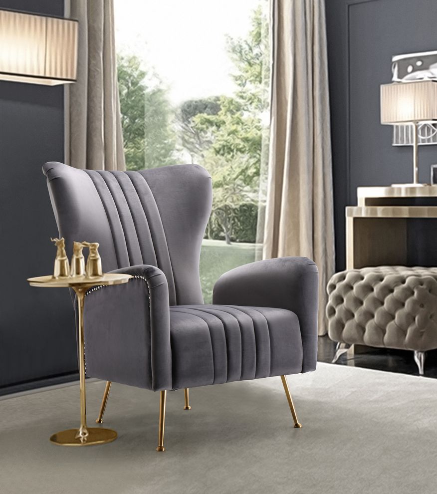 Gray velvet accent chair w/ golden legs by Meridian