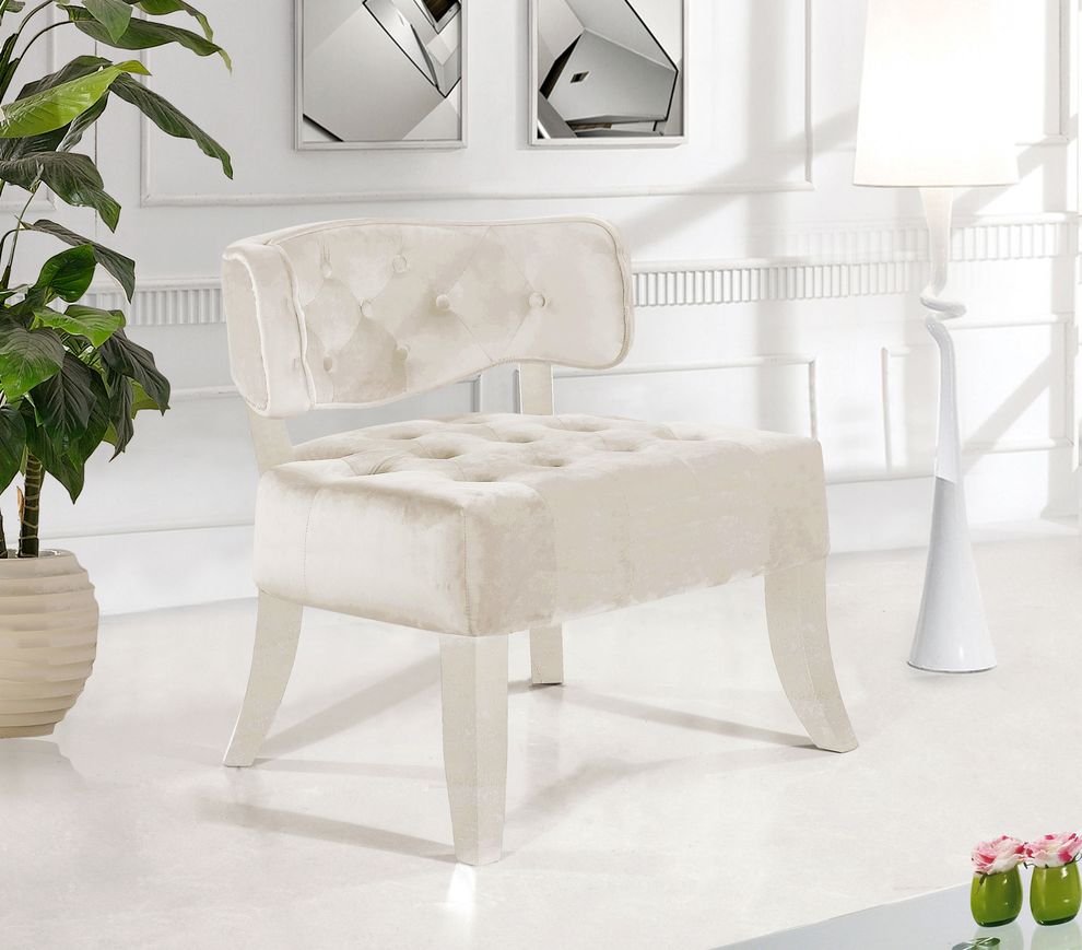 Velvet tufted chair in cream fabric by Meridian