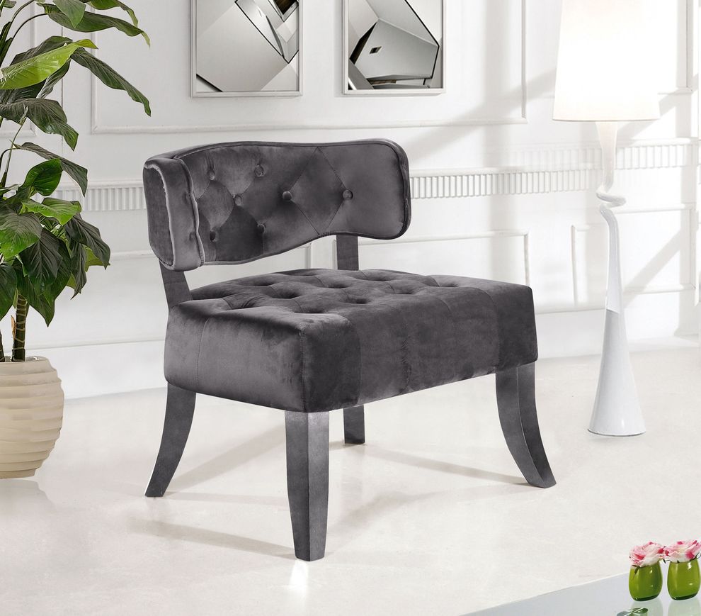 Velvet tufted chair in gray fabric by Meridian